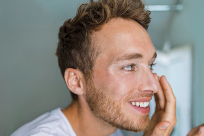 Acne Resurfacing Cleanser man smiling